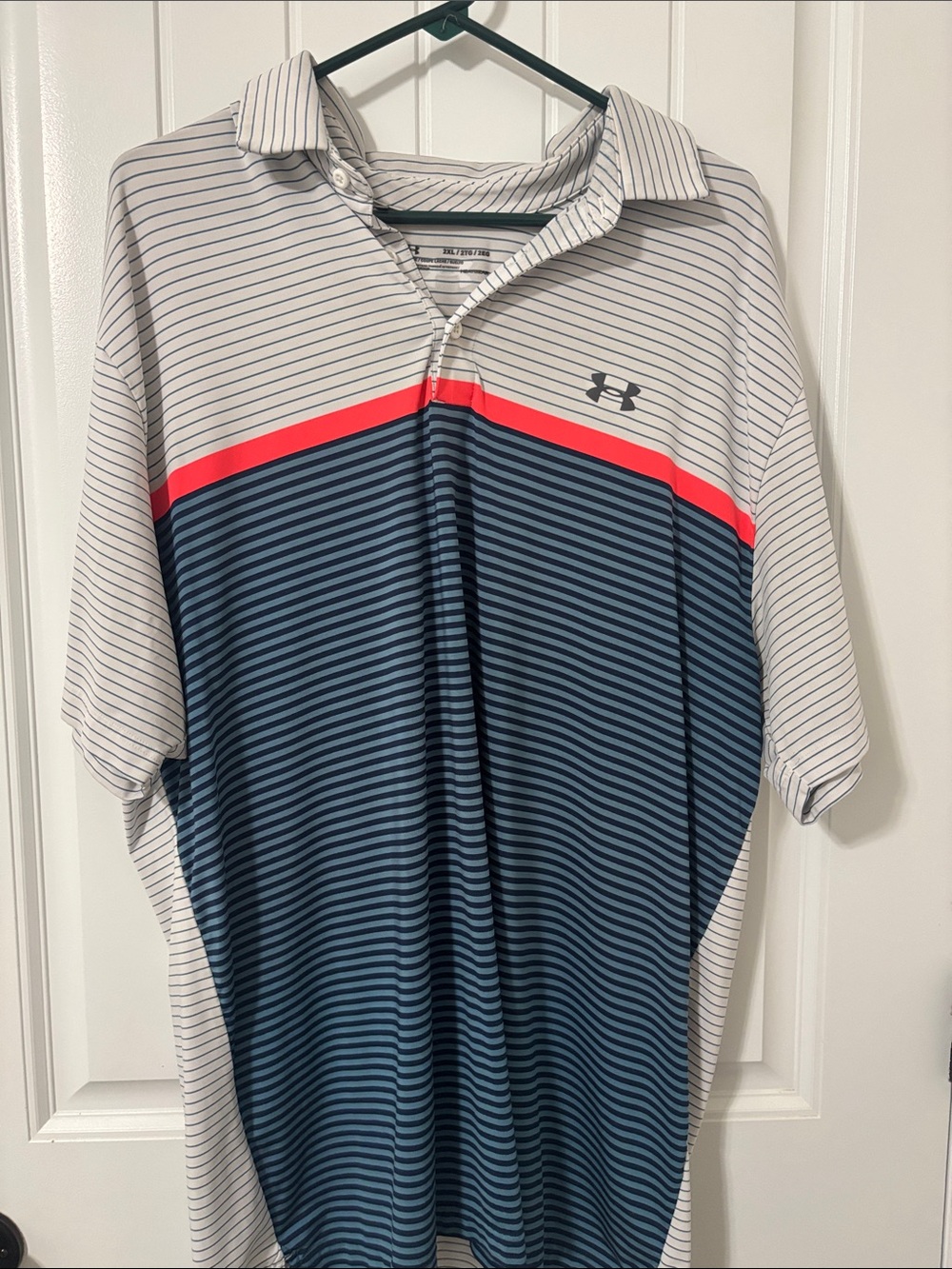 Under Armour Men’s Blue and White Striped Polo with Orange Stripe
